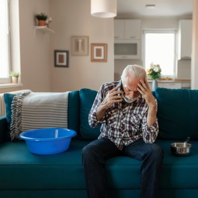 concerned resident on the phone worried about how he is going to pay for his roof replacement